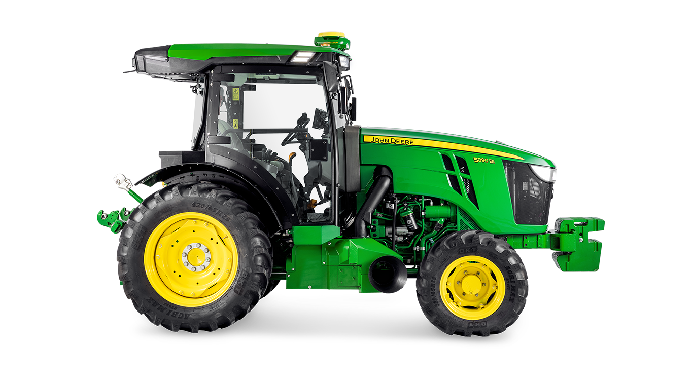Bočný profil traktora John Deere 5090EN s dôrazom na konštrukciu kabíny a veľké zadné pneumatiky.